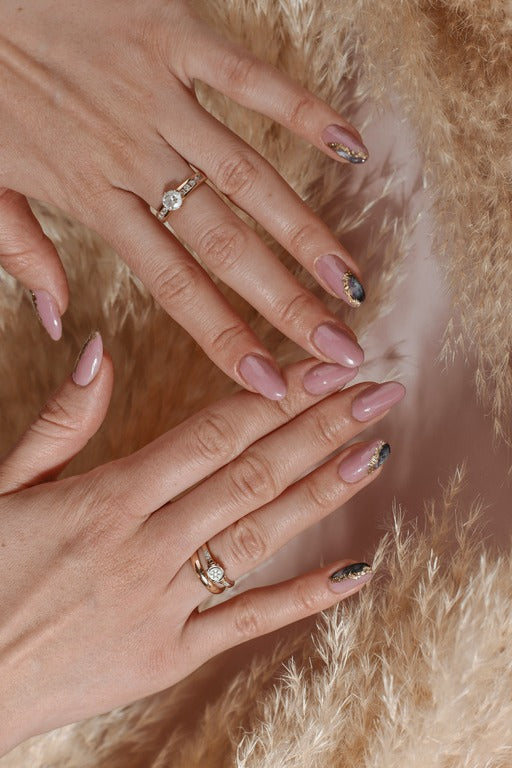 Blush Pink Almond Nails with Black-Gold Marble Accent – Luxury Collection